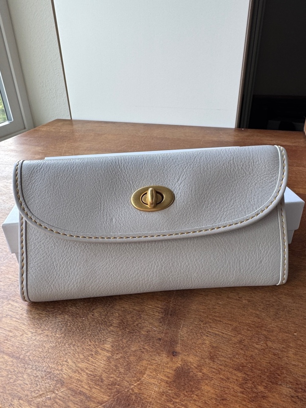 Dooney & Bourke Florentine Leather Continental Turnlock Wallet in Ecru